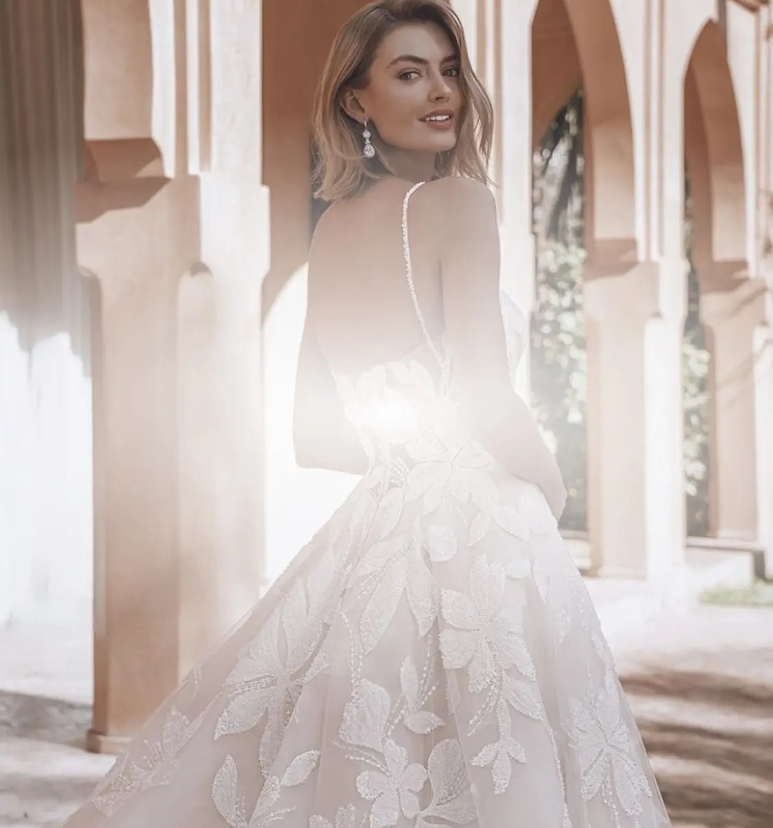 Featuring Gowns by Enzoani Mobile